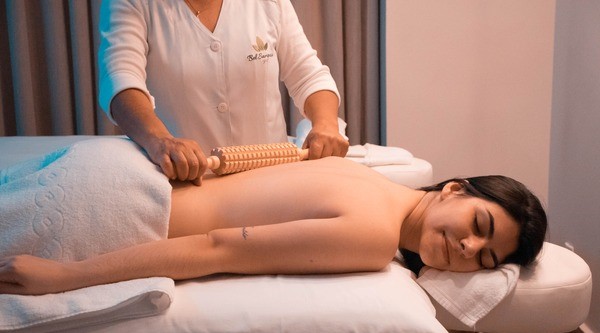 a woman who is recieving massage services